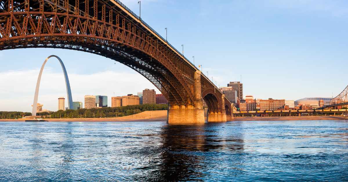 The Eads Bridge with the St. Louis Arch in the background.