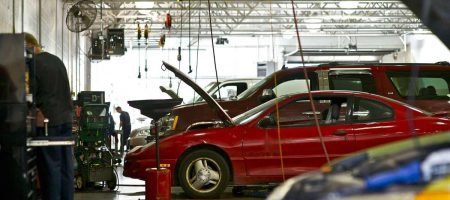 Cars at a repair shop that will soon be salvaged.