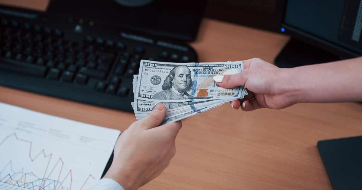 A resident of Rock Hill South Carolina exchanging cash for a car's pink slip