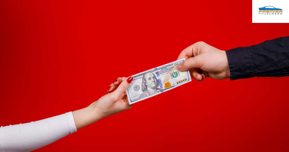 Cash in hand from a collateral loan from Premier Title Loans